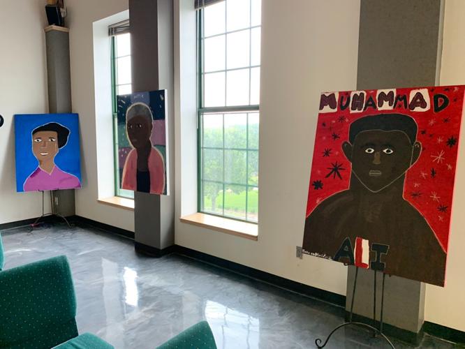 Roots 101 student art exhibit-West Louisville leaders.jpg