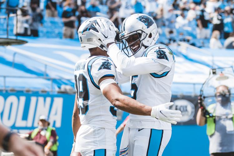 Teddy Bridgewater and Reggie Bonnafon celebrate a touchdown