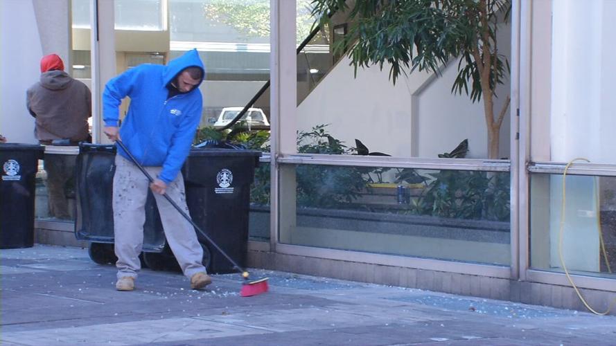 Brown & Williamson sweeping up glass