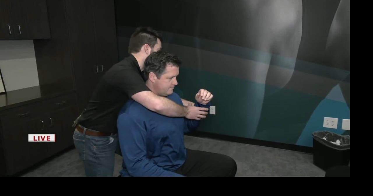 Keith Kaiser learns about different adjustments at The Joint Chiropractic