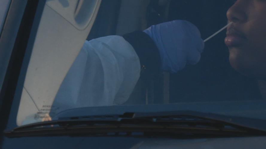 taking jcps rapid covid test.jpeg