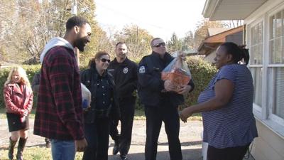 LMPD delivers turkeys to Louisville families with a Major League surprise