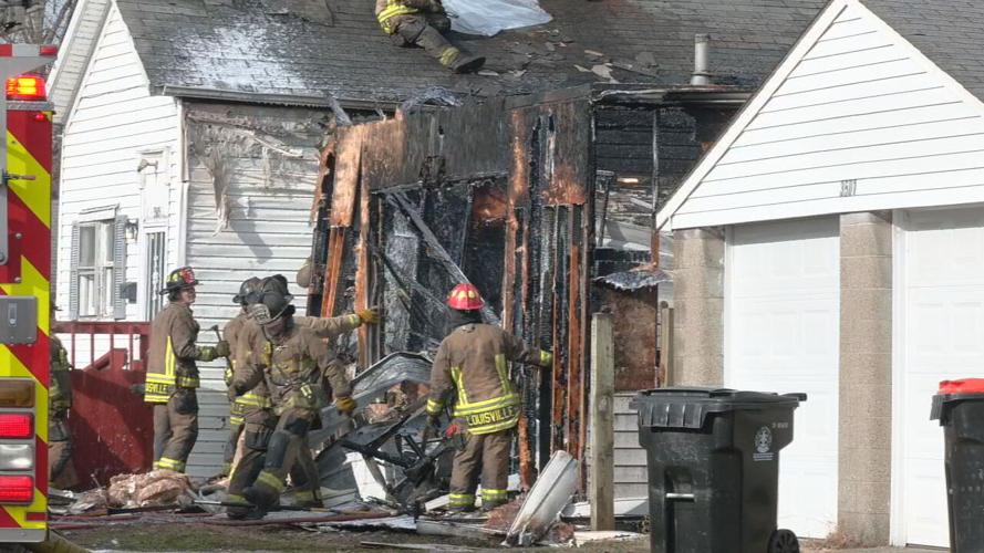 Fire causes extensive damage to structure in Louisville's Portland neighborhood. (WDRB photo)