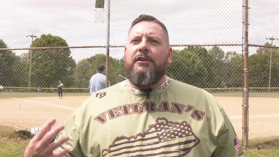 Jeremy Harrell speaks at softball game.jpeg