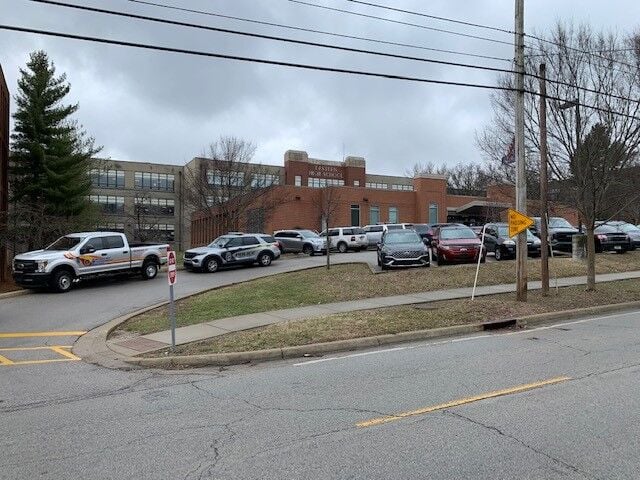 Police vehicles outside Eastern High School after gun found there on Jan. 23, 2023