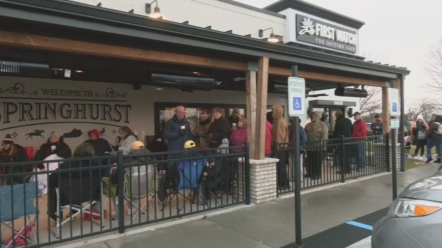 Customers waiting in line for grand opening of Louisville's first LaRosa's Pizza location