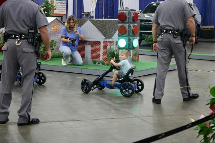 little boy riding KSP track.jpg