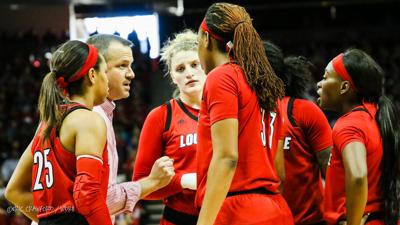 Louisville women's basketball huddle
