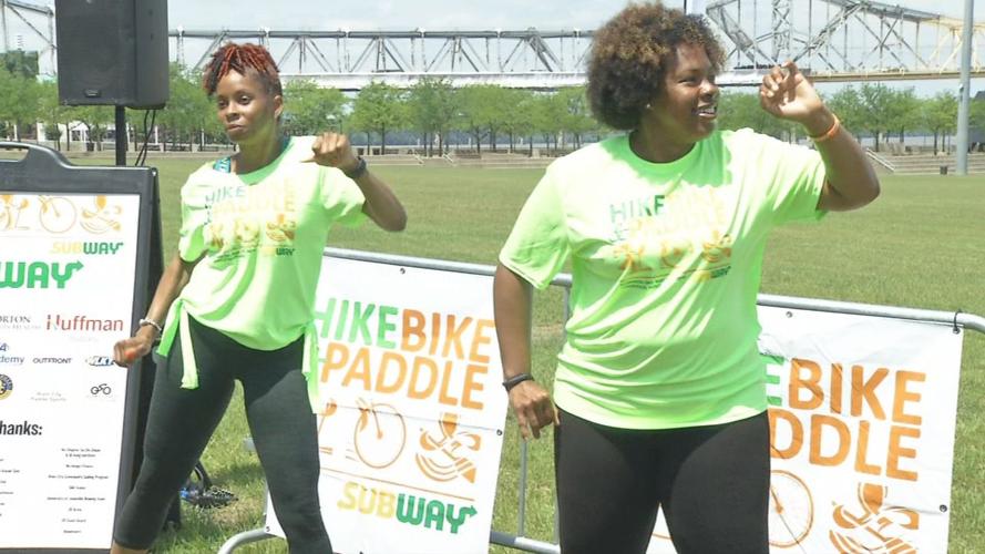 Hike, Bike and Paddle participants dance