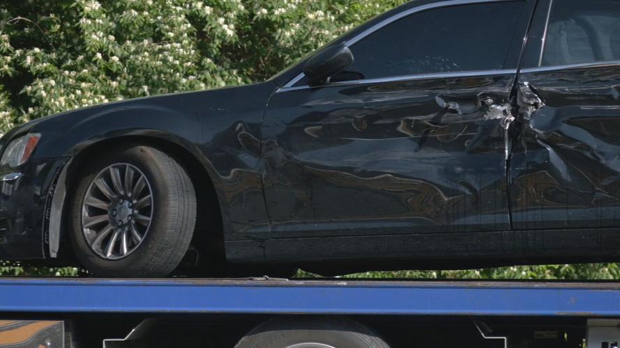 Sedan damaged in crash with JCPS bus
