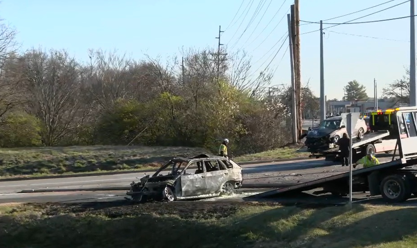 Tow truck removes crashed cars from I-264W ramp near Brownsboro Road