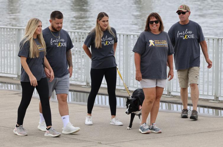 Alexis Carrico walks with her family