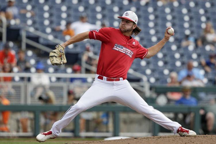 Adam Elliott (4) works against Auburn