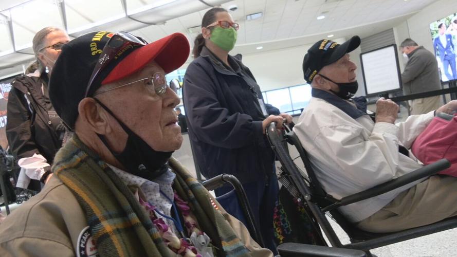 World War II veterans Stanley Parnell and Charles O'Bryan return to Louisville after Pearl Harbor trip