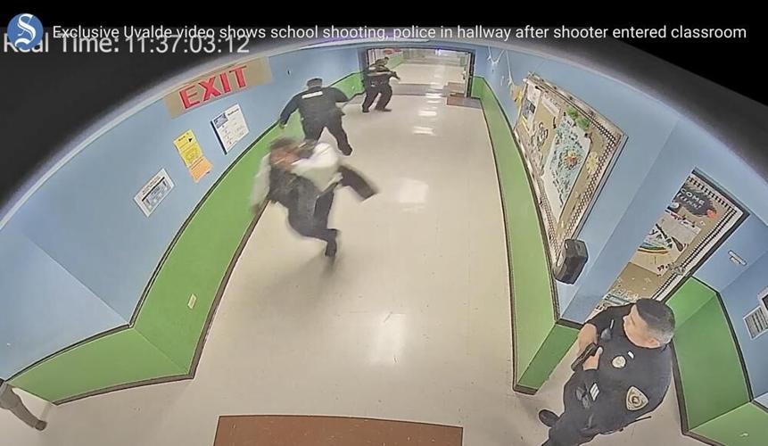 Uvalde police retreat down hallway after gunfire at Robb Elementary