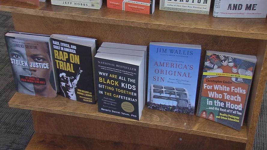 Anti-racist books on shelf.jpg