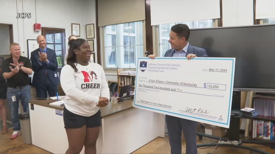 A'nya Ellison gets scholarship check