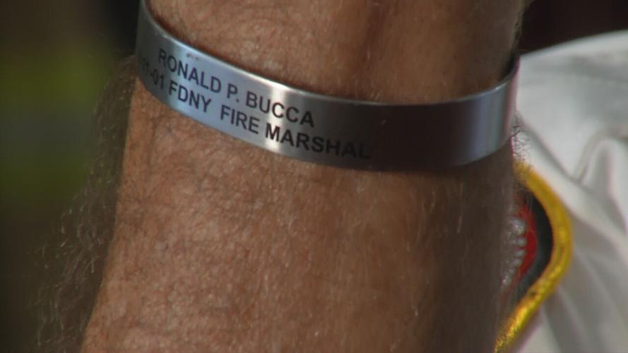 Bill Renninger wears Ronald Bucca's bracelet