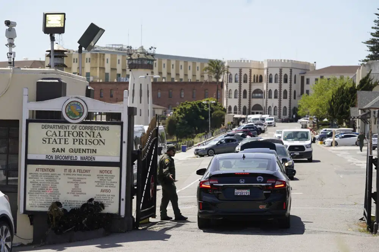 Guard checks vehicles entering San Quentin State Prison