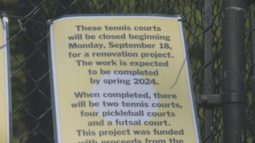 Sign on Iroquois Park Tennis court announcing closure