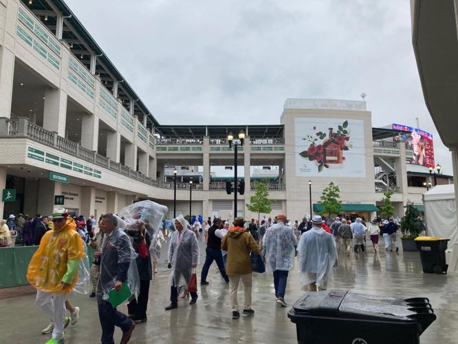 Derby fans in ponchos at Churchill Downs 5-3-25