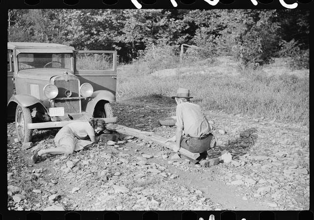 Changing a tire. Up the South Fork of the Kentucky River. Marion Post Wolcott 1940.jpg