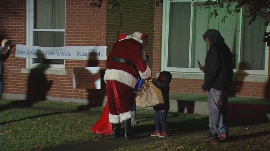 MAKE-A-WISH-SANTA VISITS SHIVELY BOY-12-23-20.jpeg