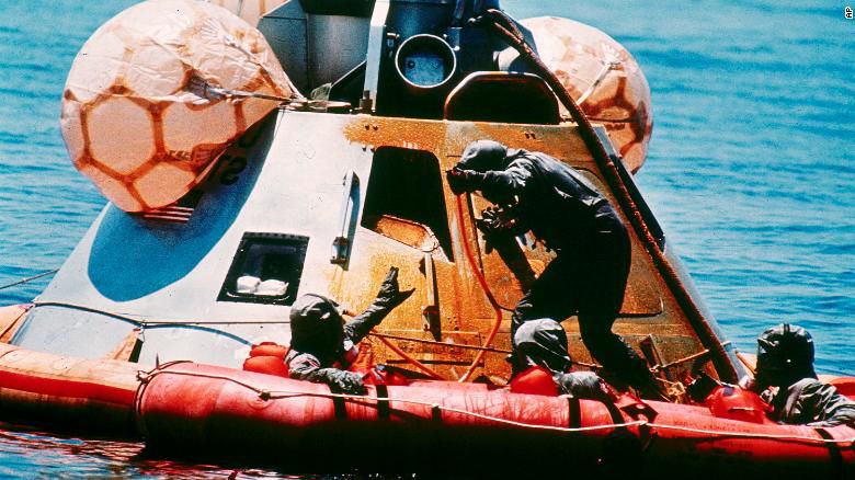 US Navy helps astronauts after landing.jpg