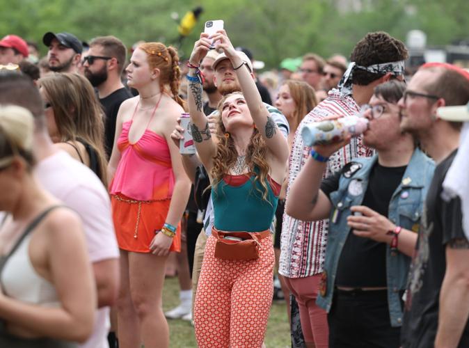A person poses for a selfie at Forecastle.JPG