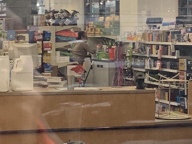 Clean up behind the counter at CVS.jfif