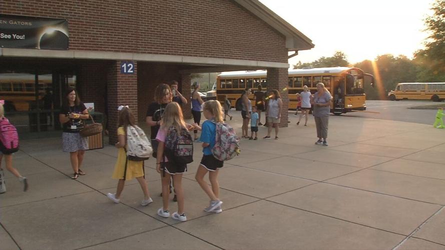 Oldham County students return to in-person classes (wearing masks)