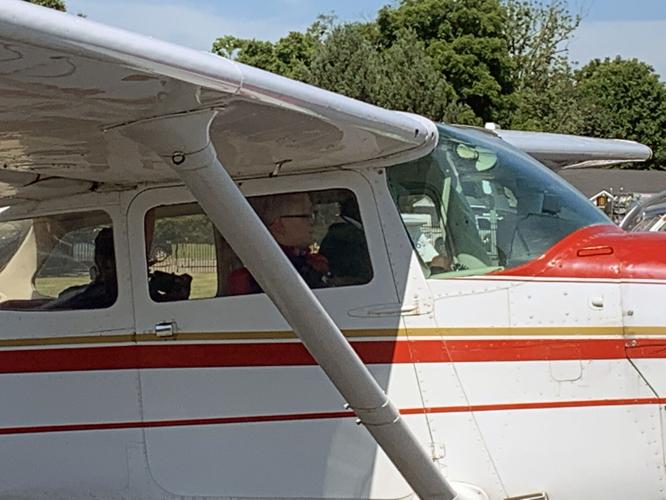 Students in the OBAP Shawnee ACE Academy taking a flight on a small plane at Louisville's Bowman Field