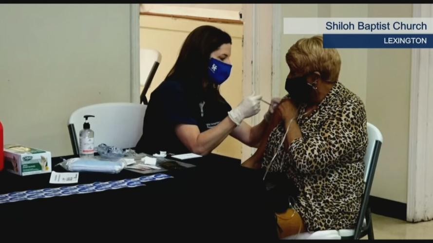 A woman receives the COVID-19 vaccine in Lexington