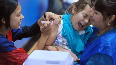 Child vaccination (crying child stuck with shot) - CNN