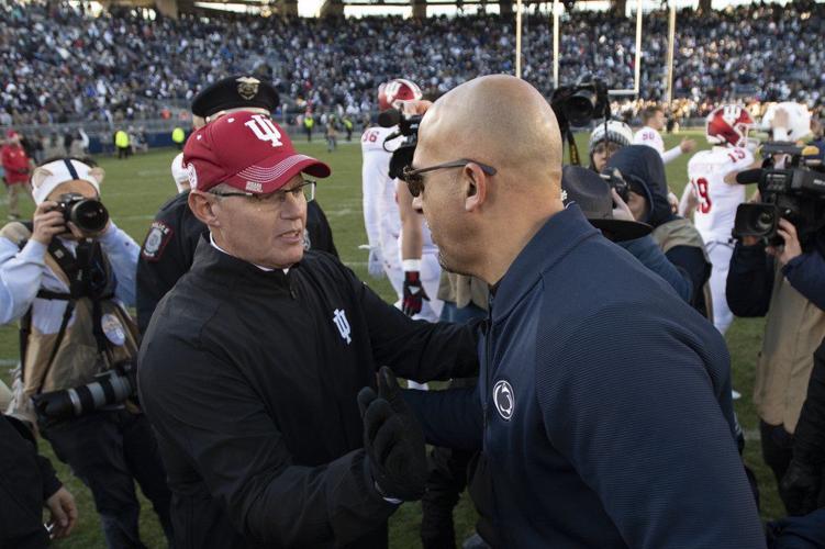 Indiana head coach Tom Allen, left, greets Penn State head coach James Franklin