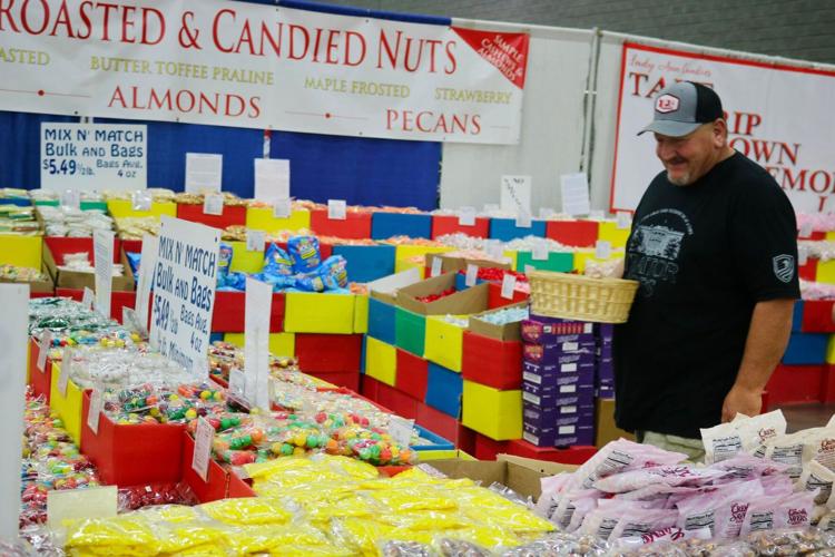 man collects candies in his basket.jpg