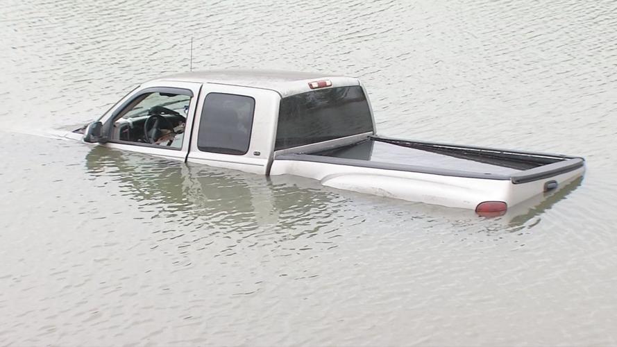 Truck submerged in pond at Louisville appliance park
