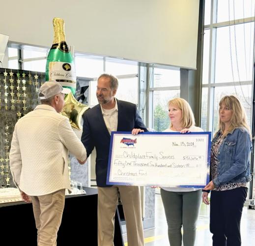 Clark County Auto Auction presents check to Childplace Family Services