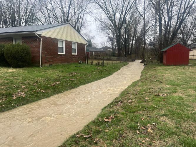 Flooded ditch near Jeffersonville home on Hamburg Pike