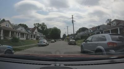 Houses line a street in west Louisville