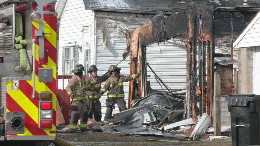 Fire causes extensive damage to structure in Louisville's Portland neighborhood. (WDRB photo)
