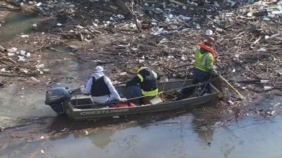 Crews begin cleaning up Louisville's 'Trash Island'