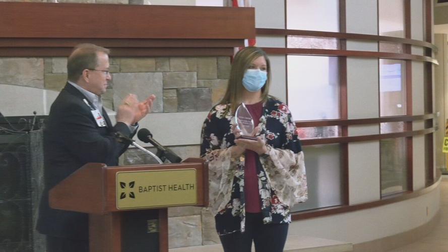 Amy Fell receives a Good Samaritan Award at Baptist Health Floyd