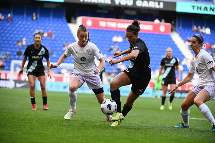 Racing Louisville Julia Ashley defends Gotham Carli Lloyd.JPG