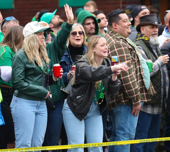 People cheer for paraders at St. Patrick's Day Parade.JPG