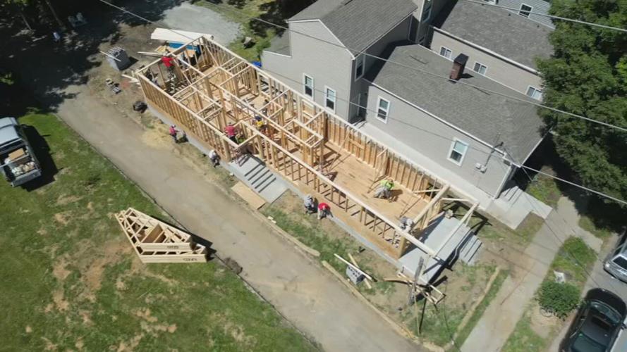 Holy high five builds house