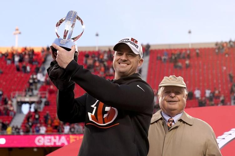 Zac Taylor holds the Lamar Hunt trophy - AP FILE.jpeg