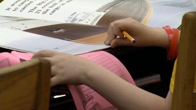 Student in classroom generic.jpg