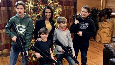 Image tweeted by Colorado US Rep. Lauren Boebert showing family holding guns