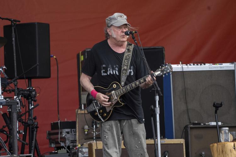 Neil Young performs with Crazy Horse during the New Orleans 2024 Jazz & Heritage Festival